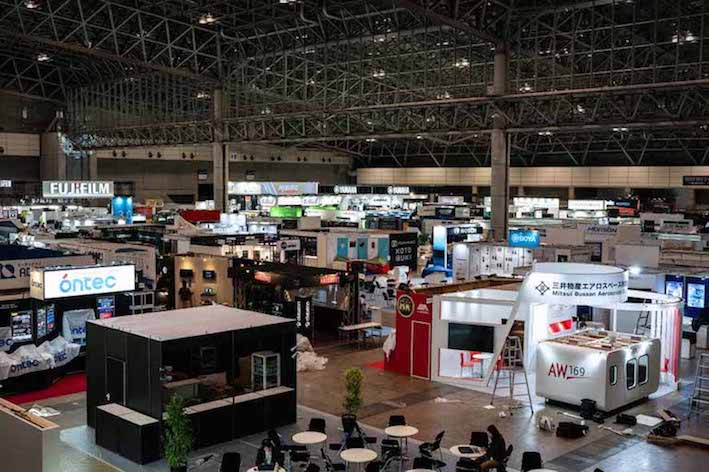 Equipment exhibit hall showing companies preparing for tomorrow’s exhibition